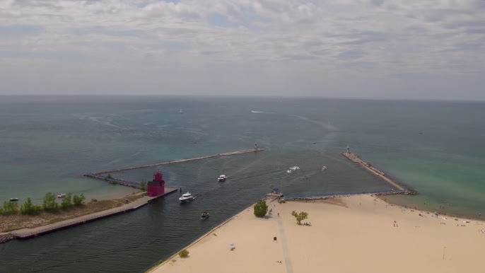 Lake Michigan ice balls appear on beach at Holland State Park