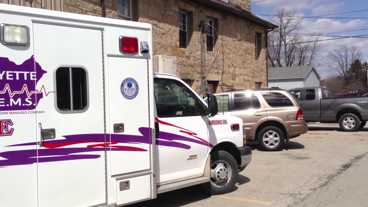 FAYETTE COUNTY EMS PARAMEDICS MEDIC 21 AMBULANCE OUTSIDE THE HOPWOOD