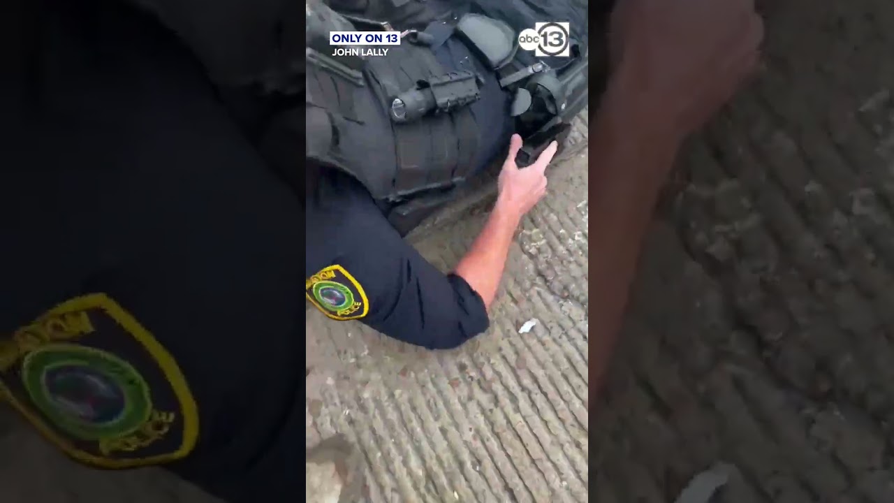 Officer dragged to safety during shootout