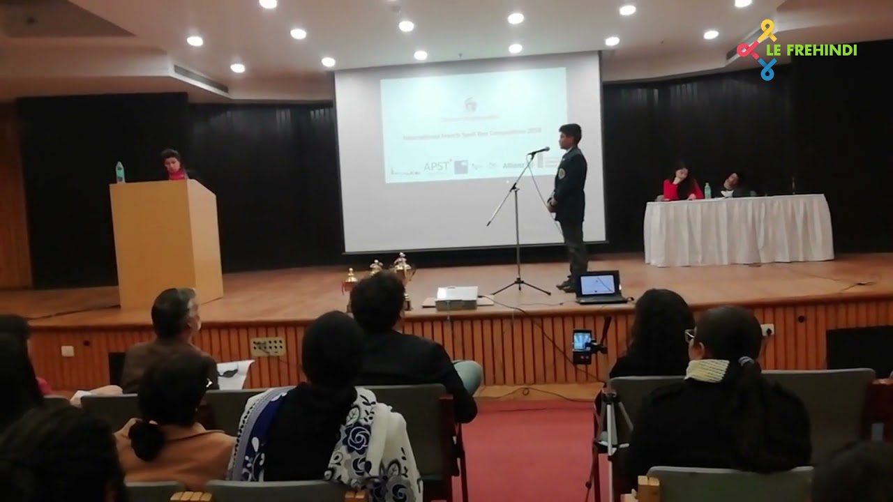 Student performing at the International French Spell Bee - YouTube