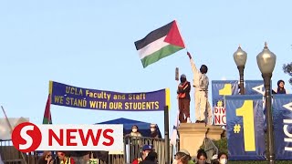 UCLA protesters stand their ground after early morning violent clashes