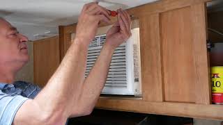 Solar air conditioner install in RV microwave cabinet