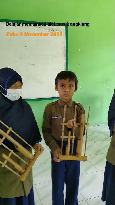 Download lagu belajar memainkan angklung