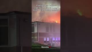 Firefighters battle significant fire at Long Island elementary school