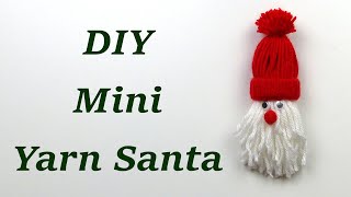 Mini Santa made of yarn. DIY Christmas decorations