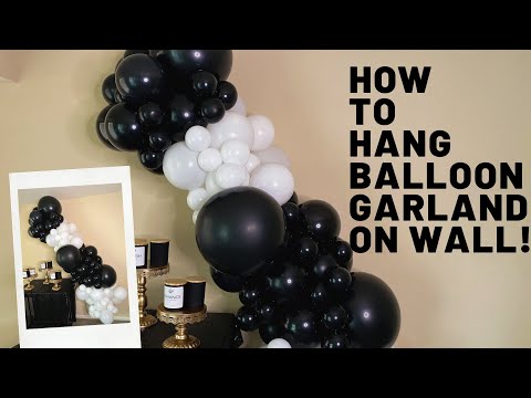 Video: How To Hang A Garland