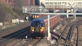 South Western Railway 455911 and 455713 departing Wimbledon