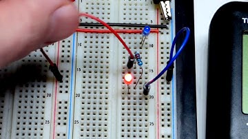 Polarity indicator circuit using red and blue LEDs with protective resistor electronics tutorial