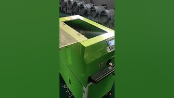 Automatic sugar cane peeling and cutting machine