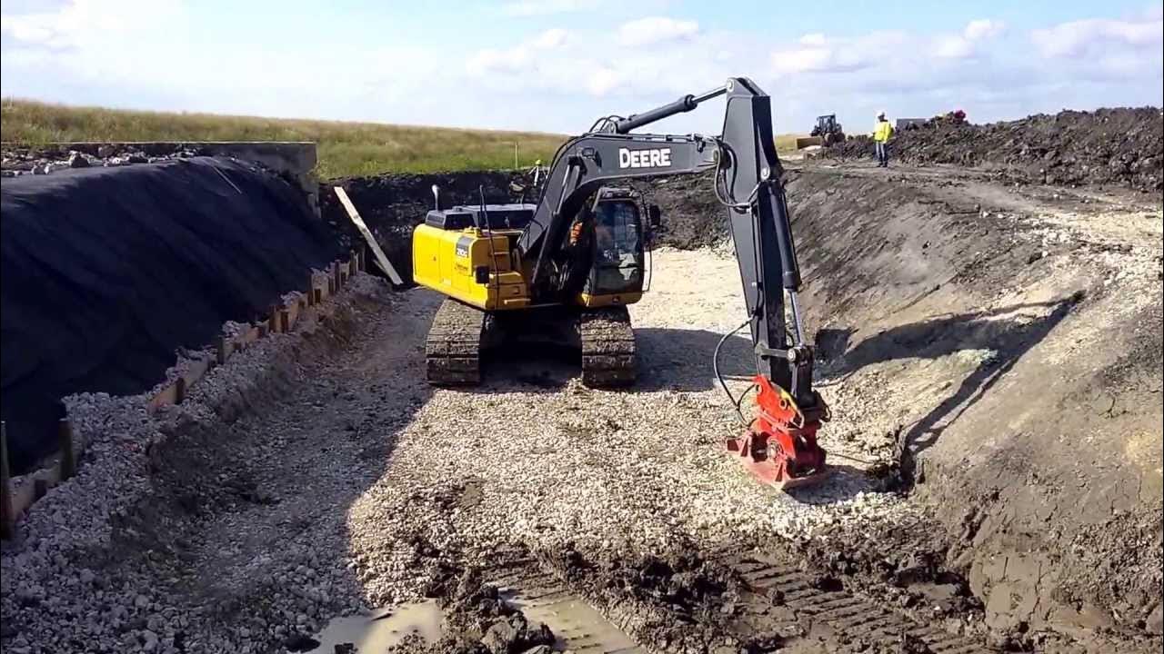 excavator-using-vibrating-plate-packer-youtube