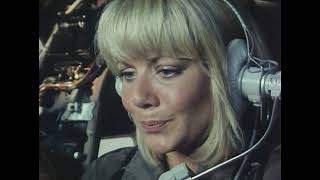 Glynis Barber as Makepeace wears vintage aviation headset in Dempsey and Makepeace s1 e4