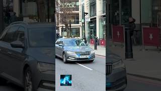 Unmarked Police Car Responding in Central London