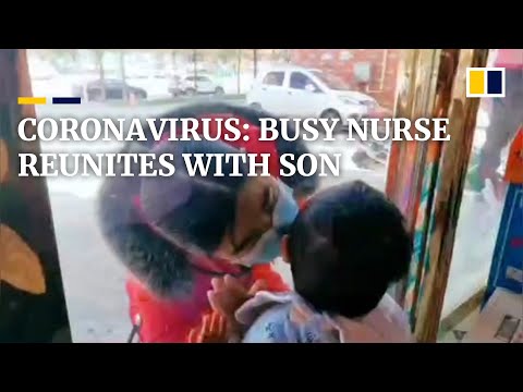 chinese-nurse-kisses-son-through-glass-window-after-26-day-separation-amid-coronavirus-outbreak