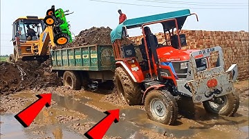 JCB 3DX plus loading machine video and Mahindra Arjun tractor Novo in mitti trolley loading video