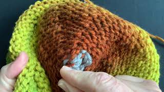 Waste yarn cast on for a neat hat top - ugly to be beautiful