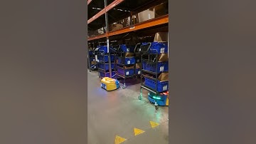 Serena robots collecting multiple trolleys in warehouse