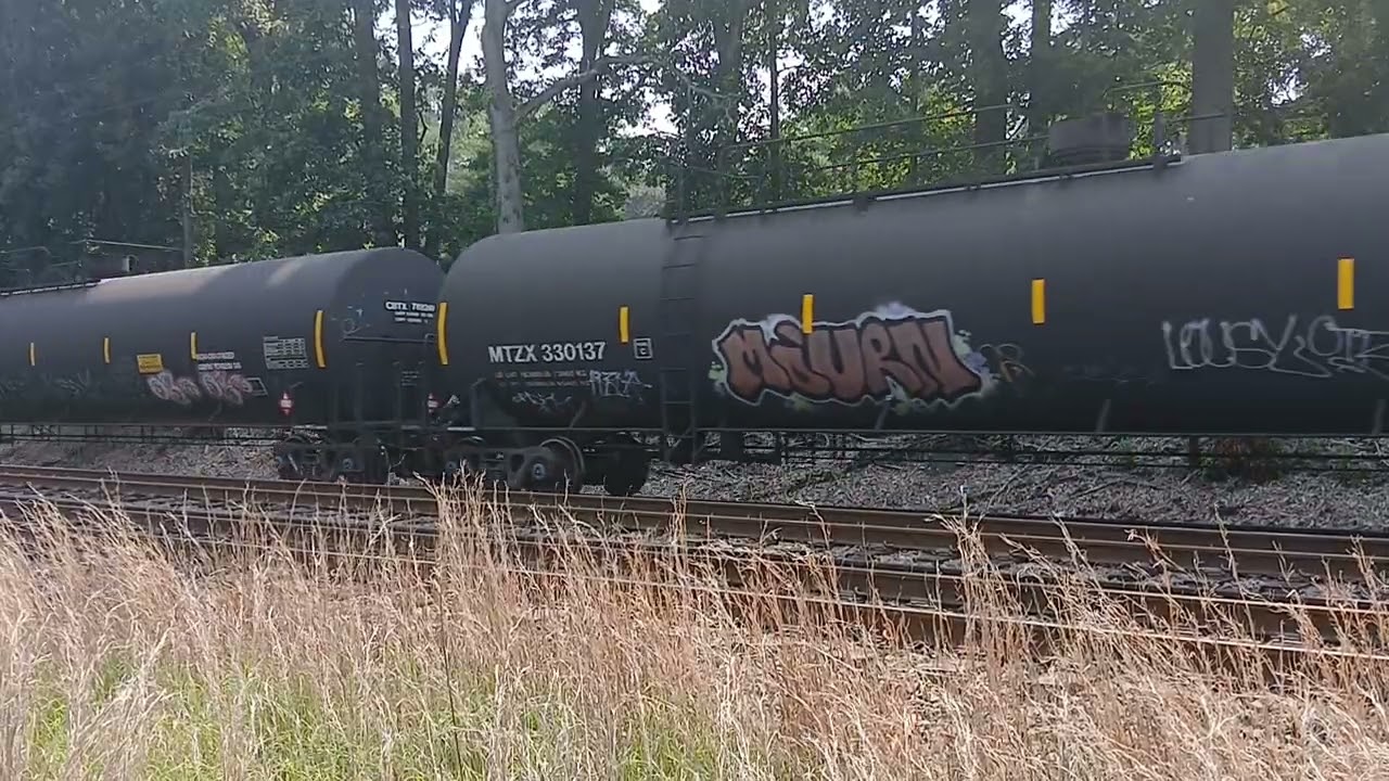 CSX leaving woodbourne yard with a YN2 and a hornshow at woodbourne in the summer 