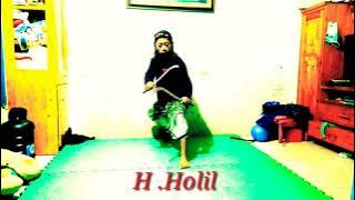 seni permainan senjata celurit kembar..