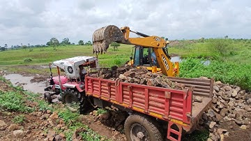 jcb tractor working video | jcb 3dx Backhoe Loading Mud in Mahindra 555 Tractor