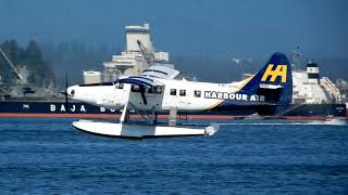 Ship traffic and seaplanes taking off in Vancouver Harbour. August 2019.