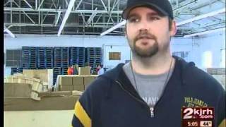 Salvation Army volunteers assemble food baskets
