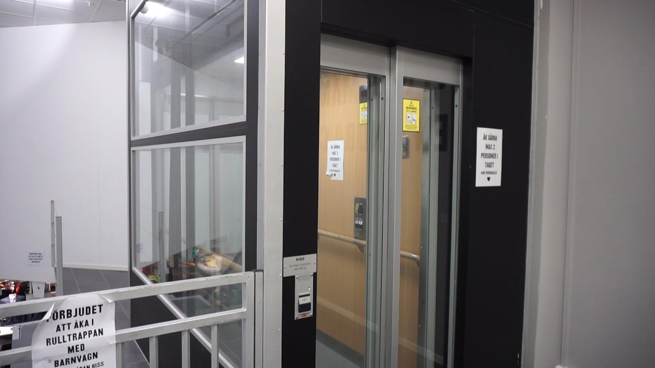NTD screw drive glass elevator with automatic doors @ Spiralen shopping center, Norrköping, Sweden