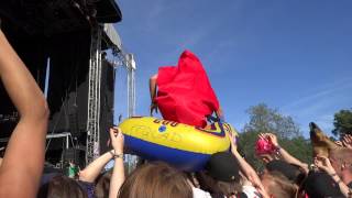 Adam Elmakias' crowd surfing on the boat during A Day To Remember perf