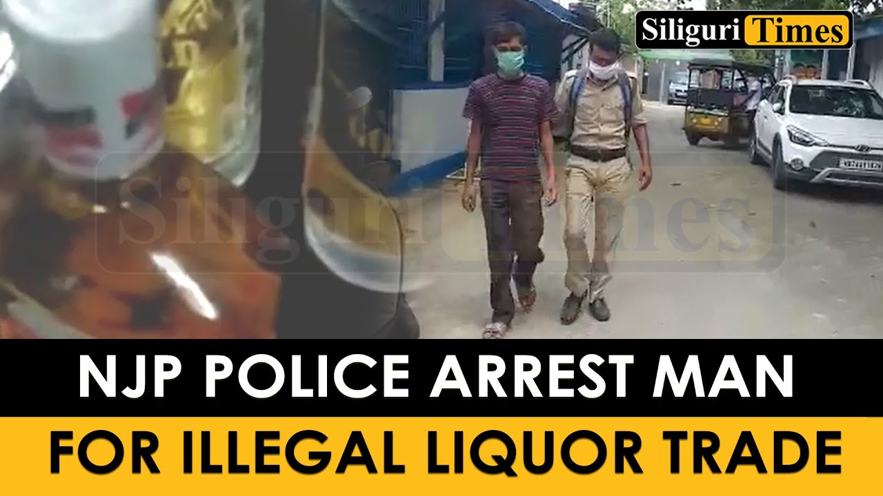 NJP police arrest man for illegal liquor trade (Bangla) - YouTube