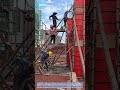 Rising Columns: How a Team Pours Wet Concrete into Towering Formwork