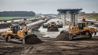 Biggest Bulldozers working on road construction projects (pushing soil, removing water, building)