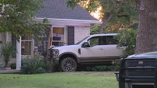 EMS respond to central Austin neighborhood after car hits home