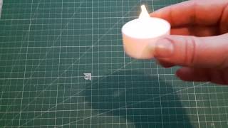 Flickering Tea Light In A Fireplace Easel Card