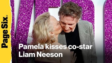 Pamela Anderson KISSES Liam Neeson on red carpet after declaring he was 