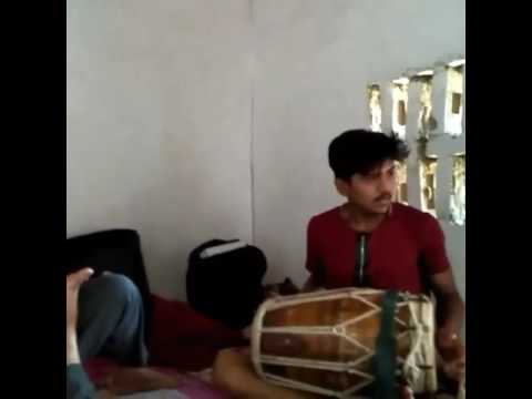 Arun playing dholak