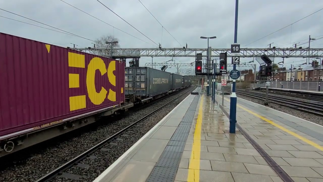 Class 90, 90006 'Modern Railways Magazine' and 68005 'Defiant' at Stafford 28/3/23