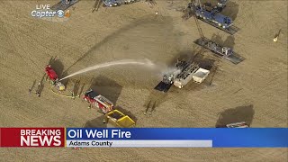 Large fire burns oil platform in Adams County