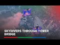 Skydivers fly through London&#39;s Tower Bridge | ABS-CBN News