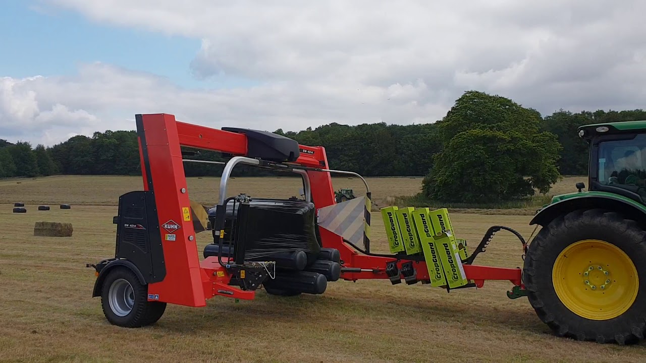 Farol Ltd | KUHN SW4014 Bale Wrapper in Action
