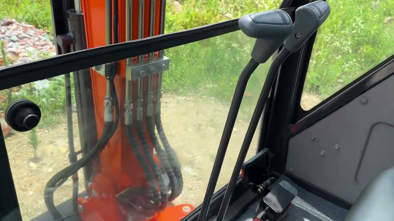 Pilot valve operation, with swing boom, high and low speed travel.