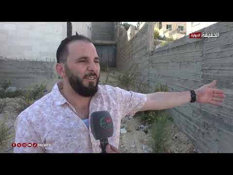 أهالي منطقة أم نوارة يطالبون بإنشاء درج في منطقة منحدرة تهدد سلامتهم اليومية