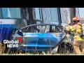 Fiery collision between Tesla and Valley Line LRT sends 1 to hospital, shuts down overpass