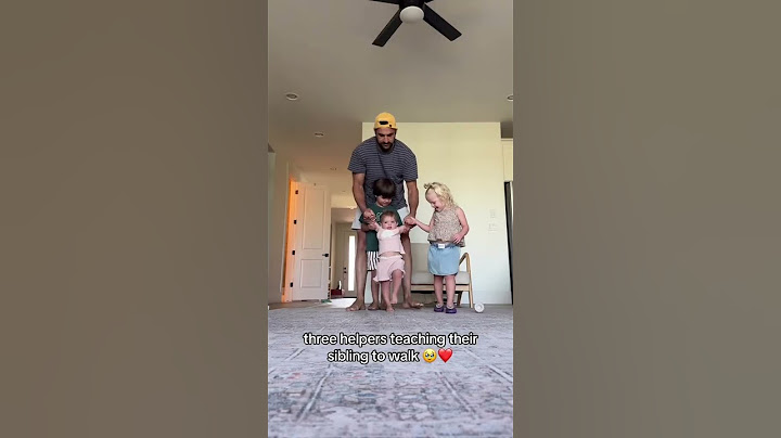 Watch What Happens When Three Helpers Teach a Baby to Walk!