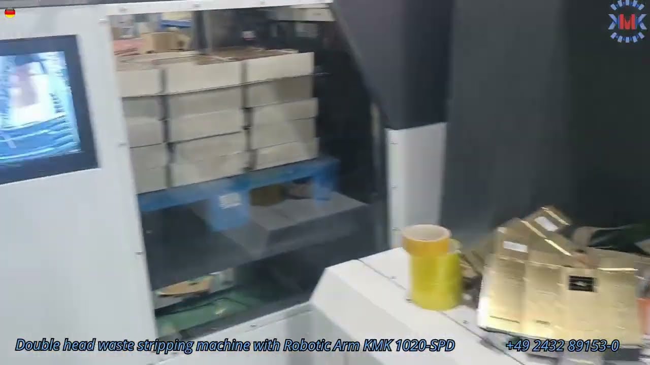 Papierentfernungsmaschine KMK 1020-SPD Double head waste stripping machine With Robotic Arm