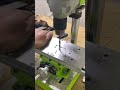 The process of drilling holes in metal using a drill machine is very neat. #youtubeshorts #trending