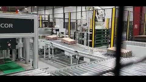 robopacker with turning crashlock boxes and palletiser backview