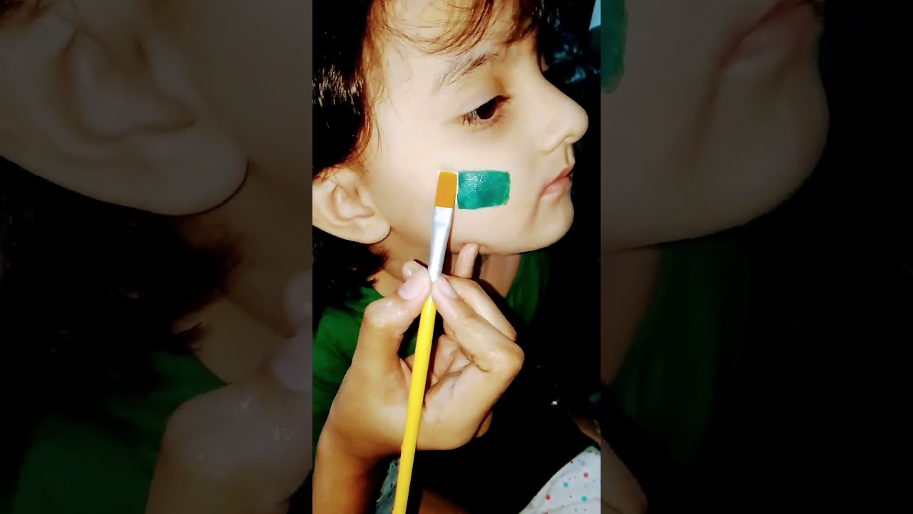 Face painting Pakistani flag for 14 august 