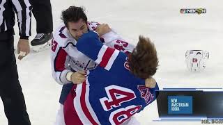 Tom Wilson takes a run at Brendan Lemieux, fights him after
