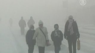 Видео Небывалые морозы: китайцы отогревают свои iPad (автор: NTDRussian)