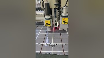 A cutter machine for Stripe and Plaid Matching process