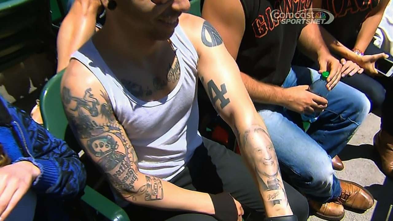 Dodgers fan makes his Scully tattoo talk 